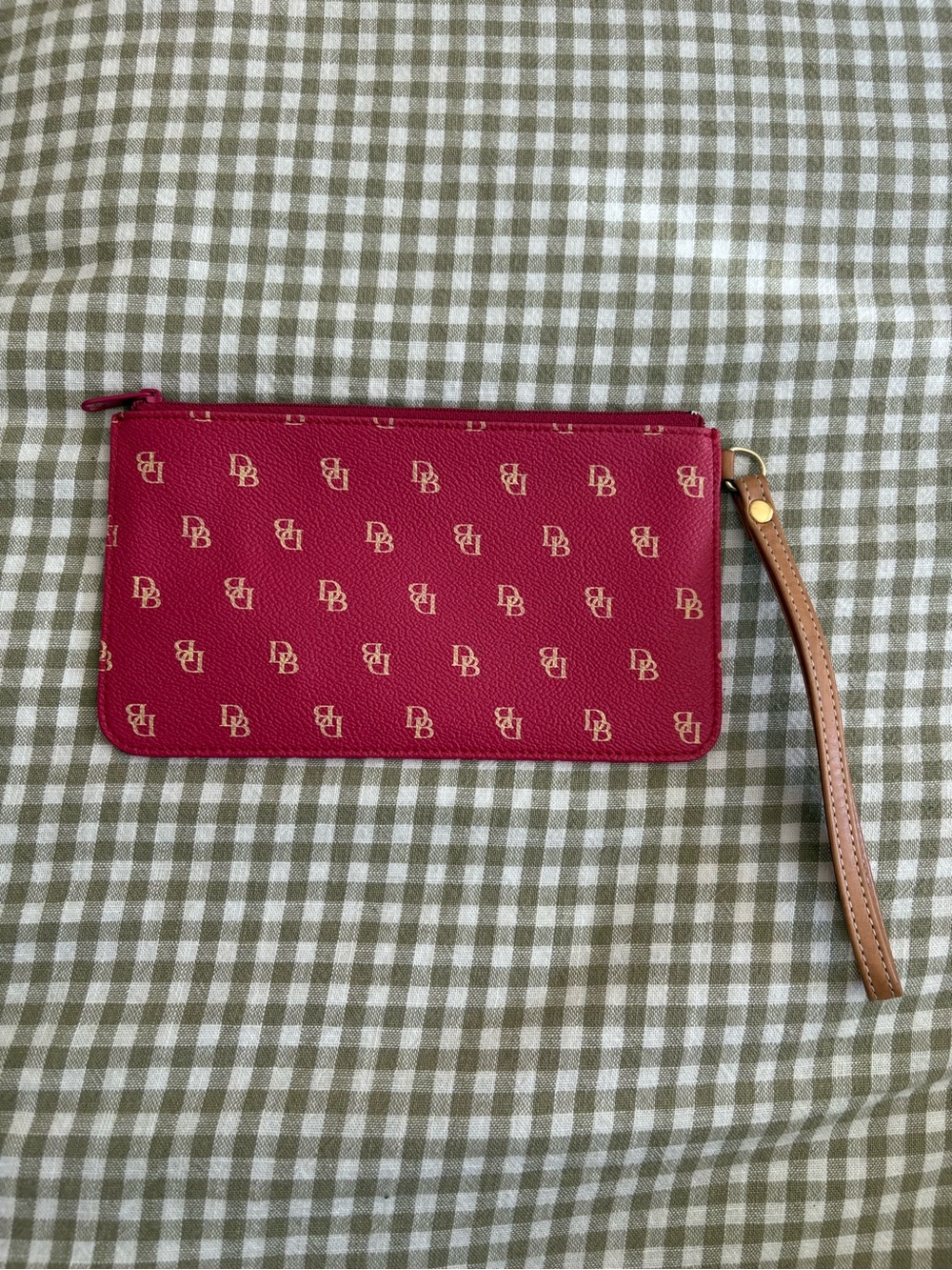 Dooney & Bourke Pink Signature Wristlet with Tan Strap